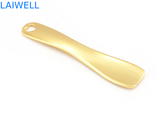 El metal de encargo a presión cuchara plateada oro del maquillaje de la crema de cara de la aleación del cinc de la fundición que sella la aguafuerte