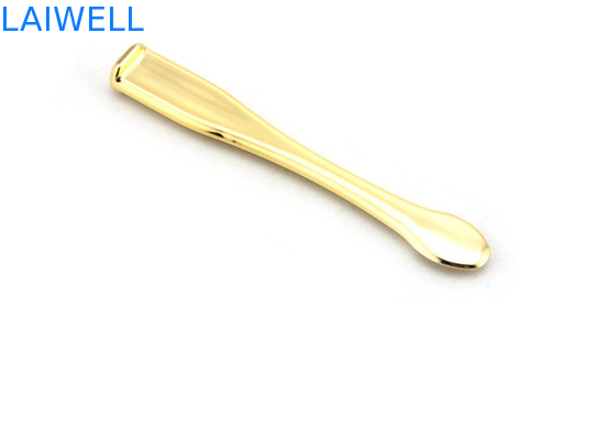 El metal de encargo a presión cuchara plateada oro del maquillaje de la crema de cara de la aleación del cinc de la fundición que sella la aguafuerte